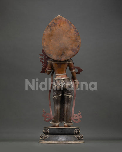 Green Tara back view—handmade oxidized copper statue showing ornate halo & robe patterns