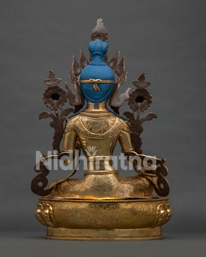 Green Tara back view, intricate hand-carved detailing on robes and double-tiered lotus pedestal base