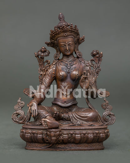 Green Tara Bodhisattva Statue seated on lotus throne holding lotus stem with Three Jewels gesture.