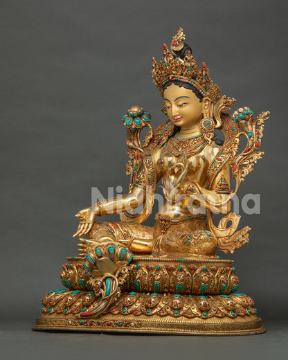 Green Tara Buddhist statue on lotus throne with semi precious stone decoration