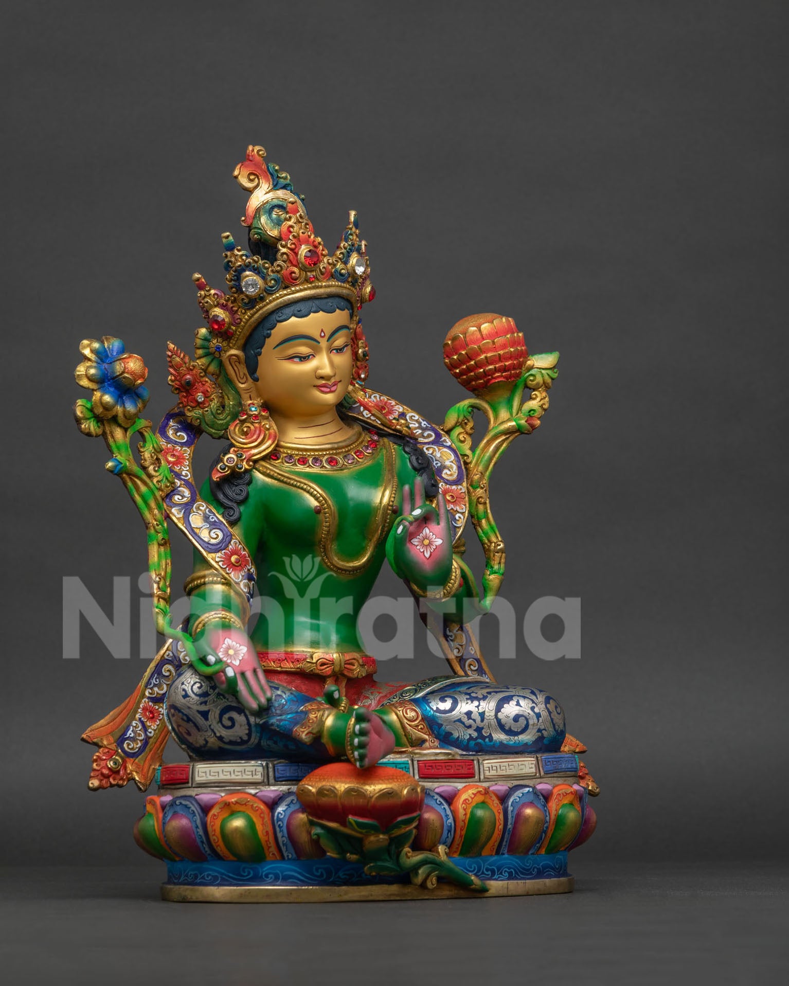 Green Tara Buddhist statue right view side showing colorful robe and ornate craftsmanship
