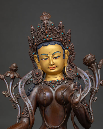 Green Tara Buddhist Statue with 24K gold painted face and lotus pedestal.