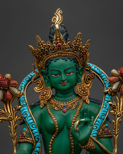 Green Tara close-up — gold-gilded crown, turquoise robe, gem lotus base and copper craftsmanship