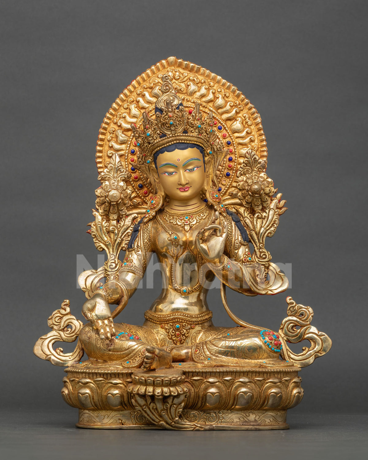 Green Tara copper statue with 24K gold fire-gilding, front view on lotus pedestal with halo