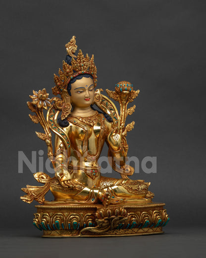 Green Tara Female Buddha statue right side view fire-gilded copper utpala lotus handmade Nepal