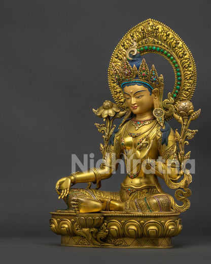 Green Tara left side: varada mudra hand, ornate necklace, handcrafted Nepal Buddhist art