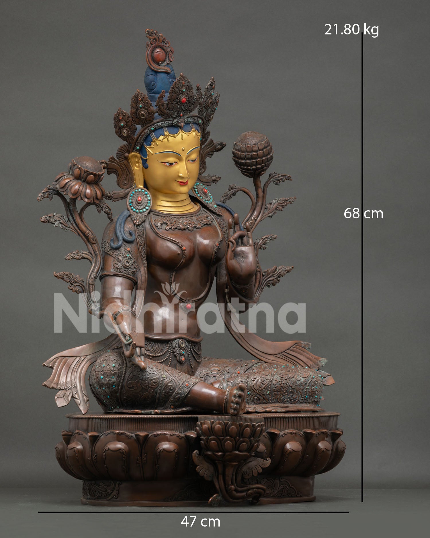 Green Tara right side view—Nepali copper Buddhist statue in Varada mudra blessing gesture pose
