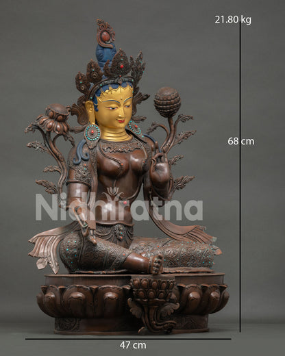 Green Tara right side view—Nepali copper Buddhist statue in Varada mudra blessing gesture pose