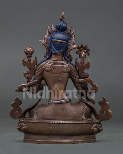 Green Tara sculpture lotus posture, oxidized copper finish, and authentic Himalayan Buddhist artistry.