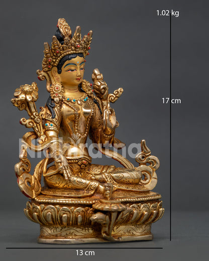 Green Tara seated gracefully with Varada Mudra offering compassion and blessings