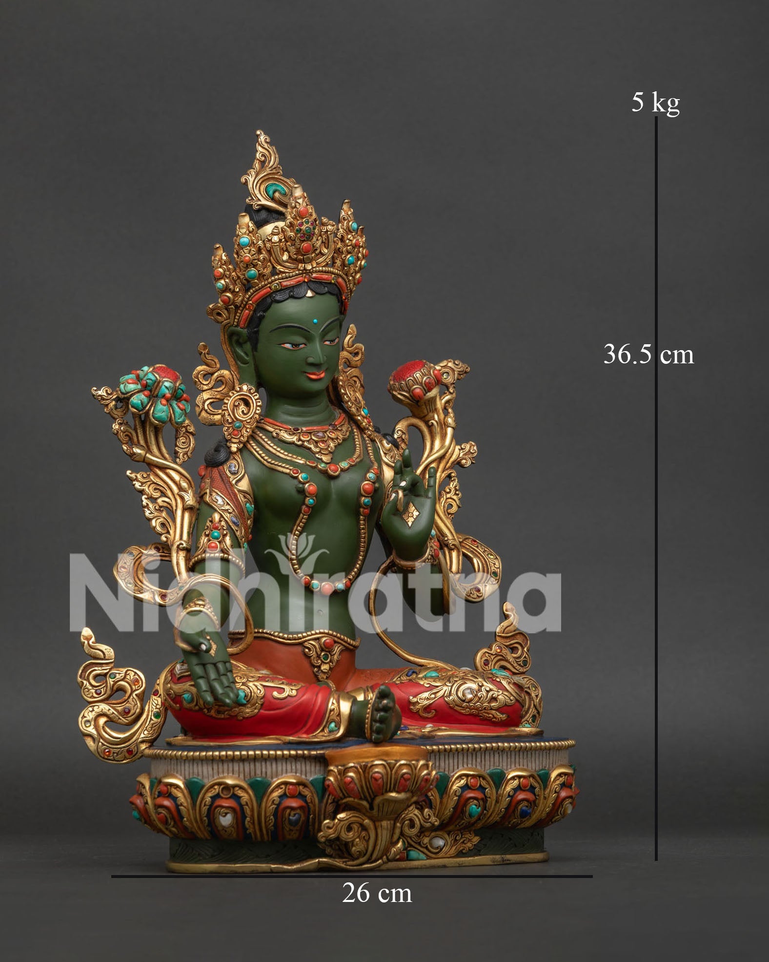 Green Tara seated in royal ease posture on a lotus flower with intricate details
