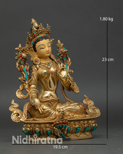 Green Tara side view seated lotus posture holding utpala lotus varada abhaya mudra gold copper statue