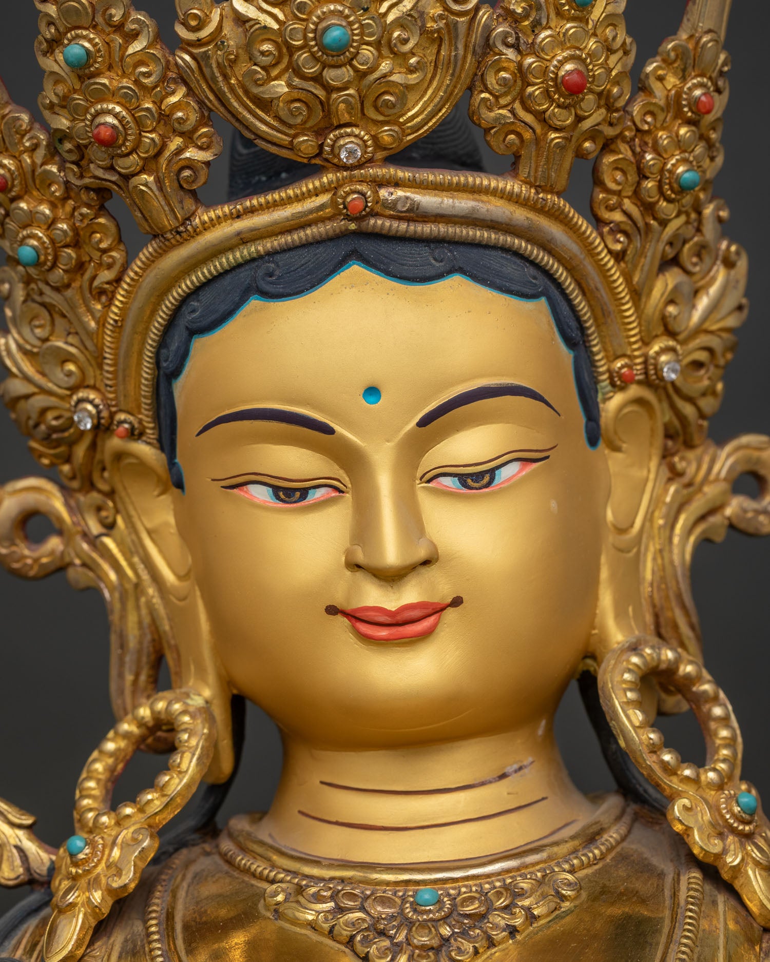 green tara statue 24k gold fire gilded serene face detailed close up