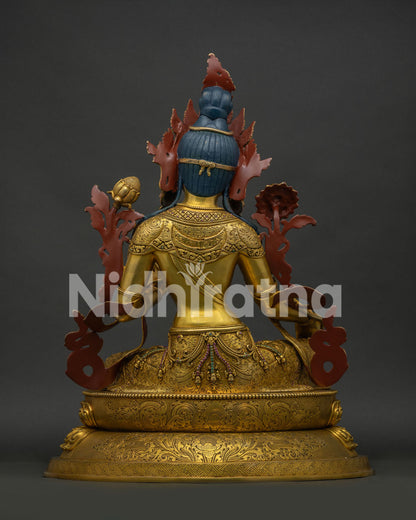 Green Tara Statue back view displaying copper craftsmanship and ornamental design