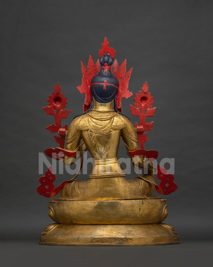 Green Tara Statue back view, gold gilded crown and engraved robe detail