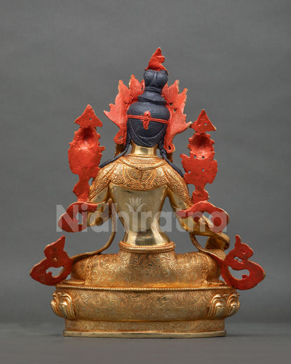 Green Tara Statue back view hand carved floral details gold fire gilded copper.
