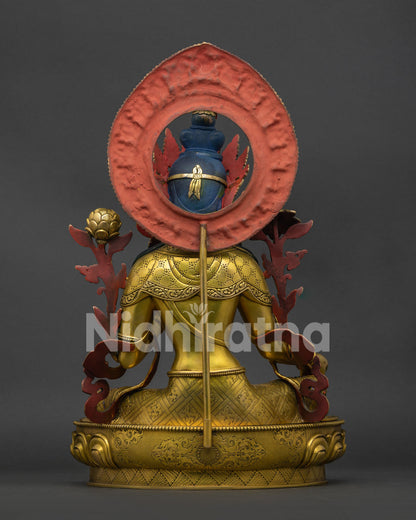 Green Tara statue back view: ornate halo, repoussé detailing, handcrafted Nepalese work