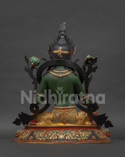 Green Tara statue back view sacred mantra inscription gold-gilded lotus throne base