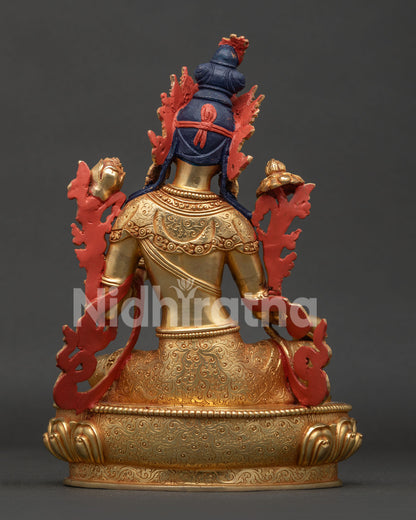 Green Tara statue back view showing hand carved garment and traditional Newari craftsmanship.