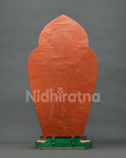 Green Tara statue back view showing repoussé-detailed garments and handcrafted copper halo