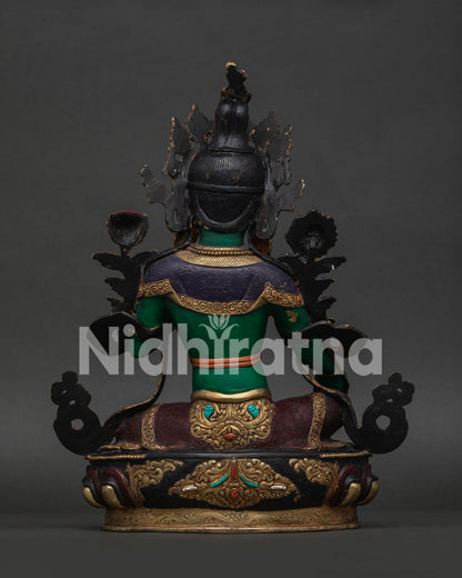 Green Tara Statue Back View with Intricate Himalayan Ornaments and Lotus Pedestal Details.