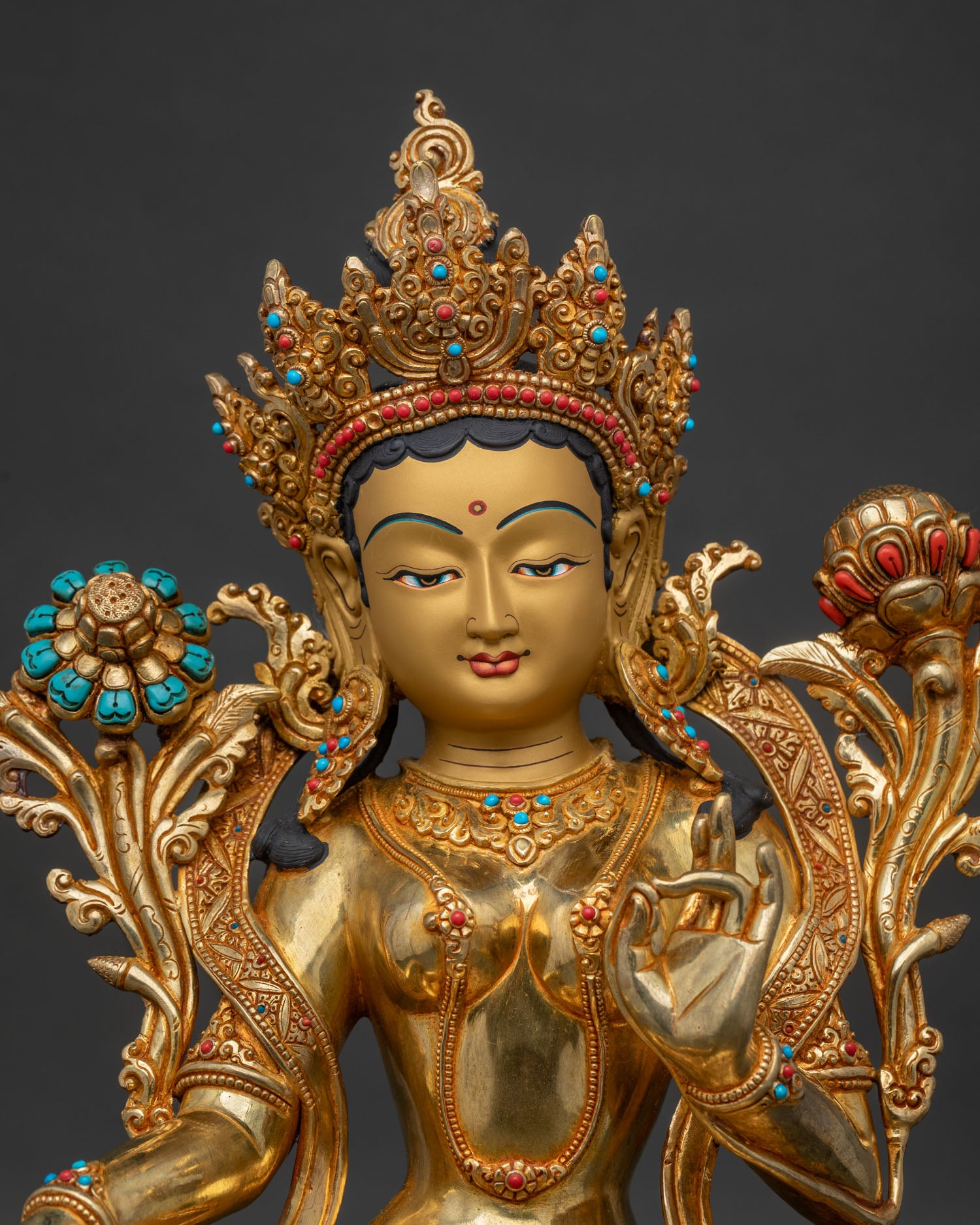 Green Tara statue close-up, gold gilding & turquoise inlay, Nepalese craftsmanship