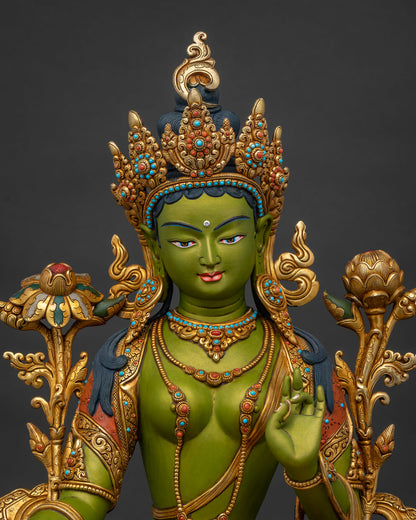 Green Tara statue close-up – hand-painted gold-gilded copper Buddhist deity detail