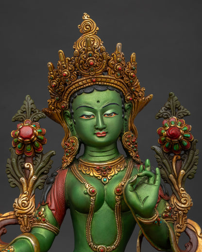 Green Tara statue close-up, Newari copper sculpture with turquoise stone inlay