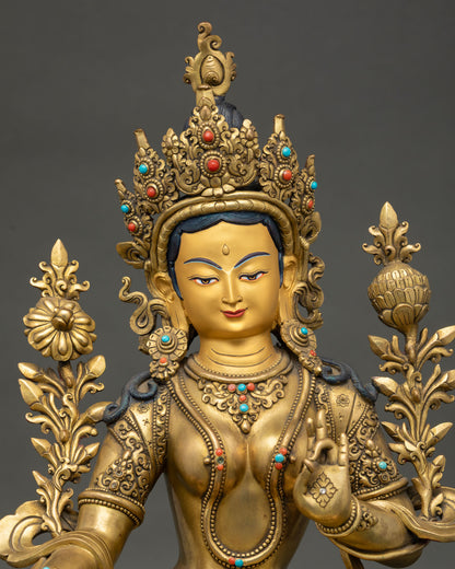 green tara statue close up showing intricate crown jewelry and nepalese craftsmanship