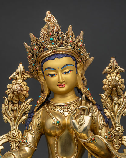 Green Tara Statue close up showing intricate ornaments and gold-painted face details