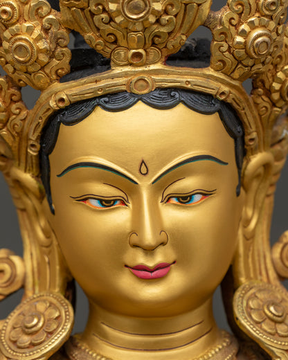 Green Tara Statue Face Close Up, Detailed Serene Expression Copper Sculpture