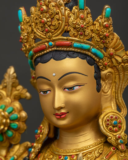 Side close up of Japan Green Tara's face highlighting gold gilding and crown craftsmanship