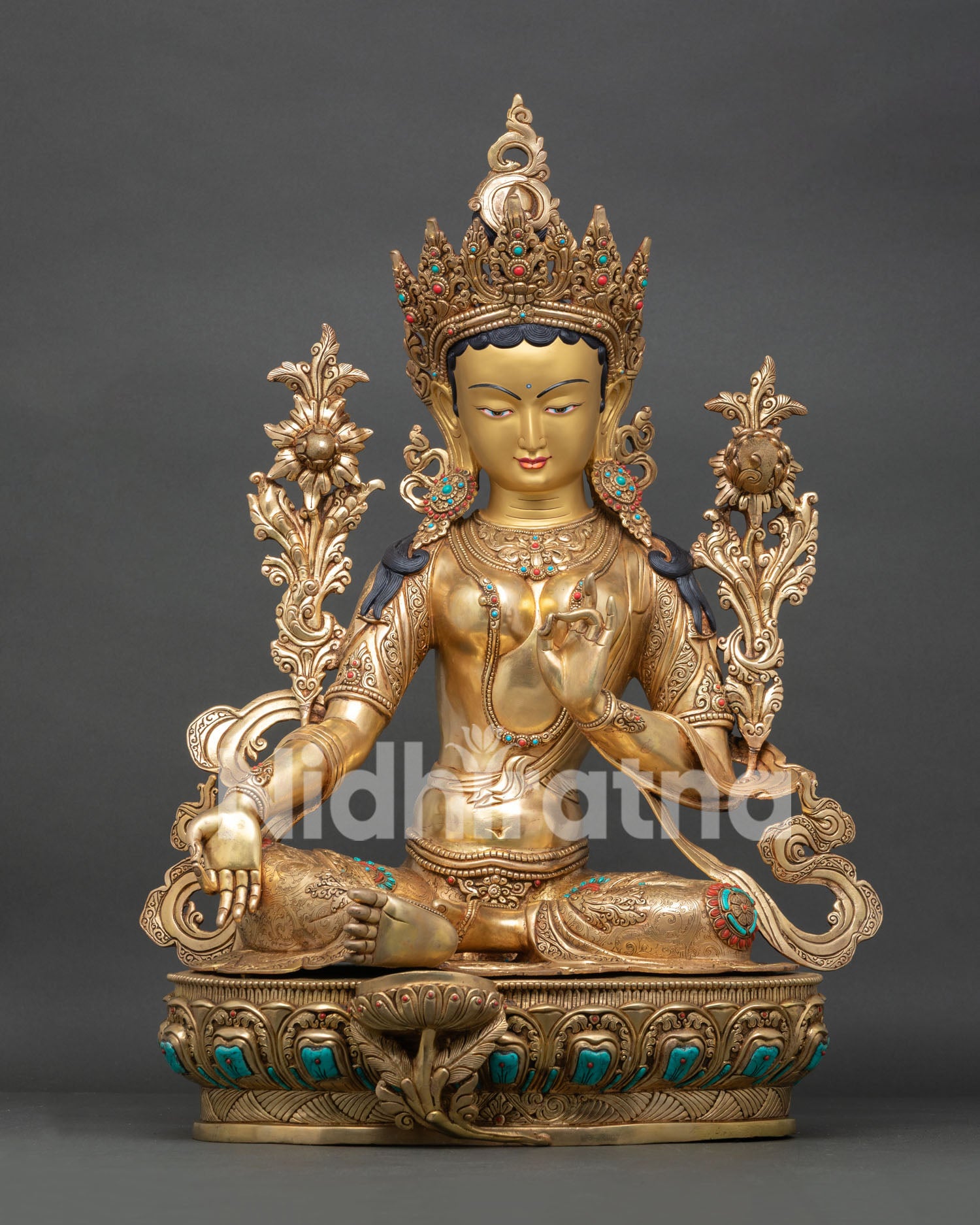 Green Tara Statue from Nepal, featuring semi-precious stones, and intricate Buddhist craftsmanship.