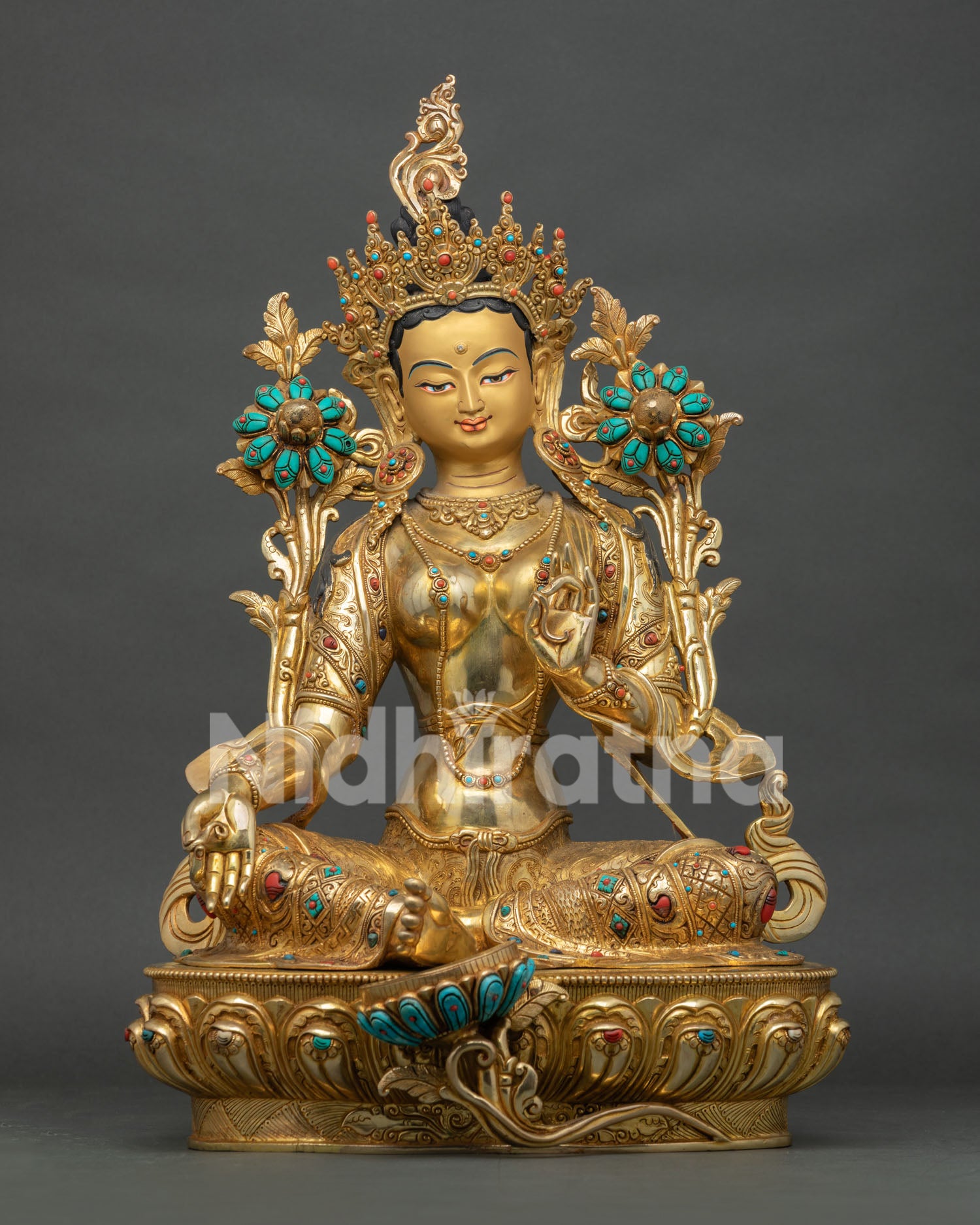 Green Tara statue from Nepal with handcrafted gold finish and sacred Buddhist art