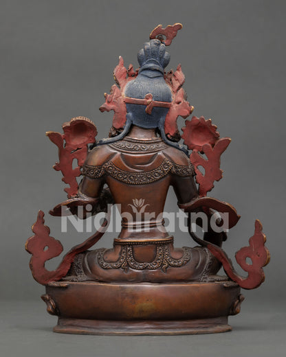 Green Tara Statue front view handcrafted oxidized copper with gold painted face from Nepal.