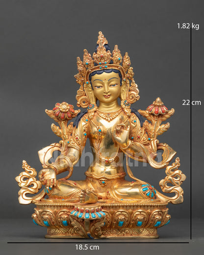 Green Tara statue front view with 24K gold face and ornate jeweled crown on lotus pedestal.