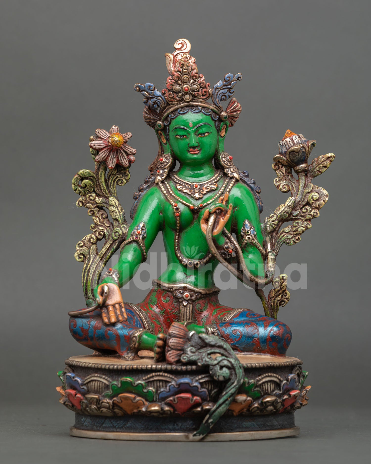 green tara statue front view with acrylic painting and semi-precious stone details