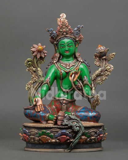green tara statue front view with acrylic painting and semi-precious stone details