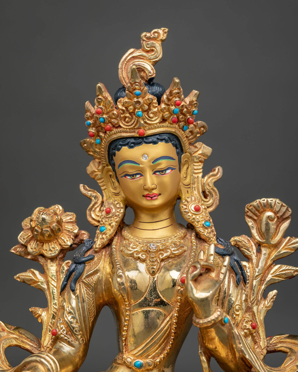 Green Tara statue gold painted face semi precious stones lotus.