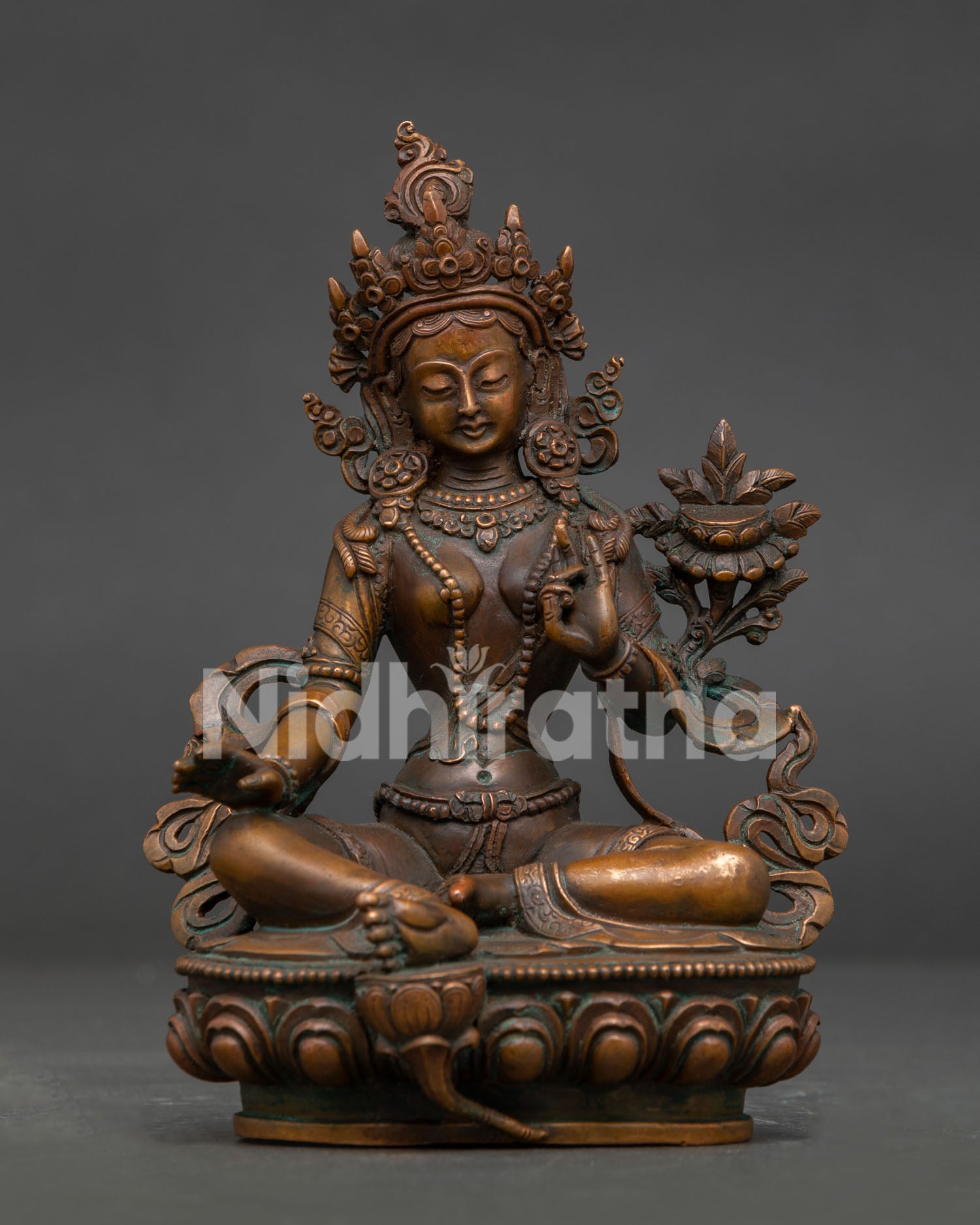 Green Tara statue handcrafted by Newari artisan in Patan Nepal copper oxidized finish.