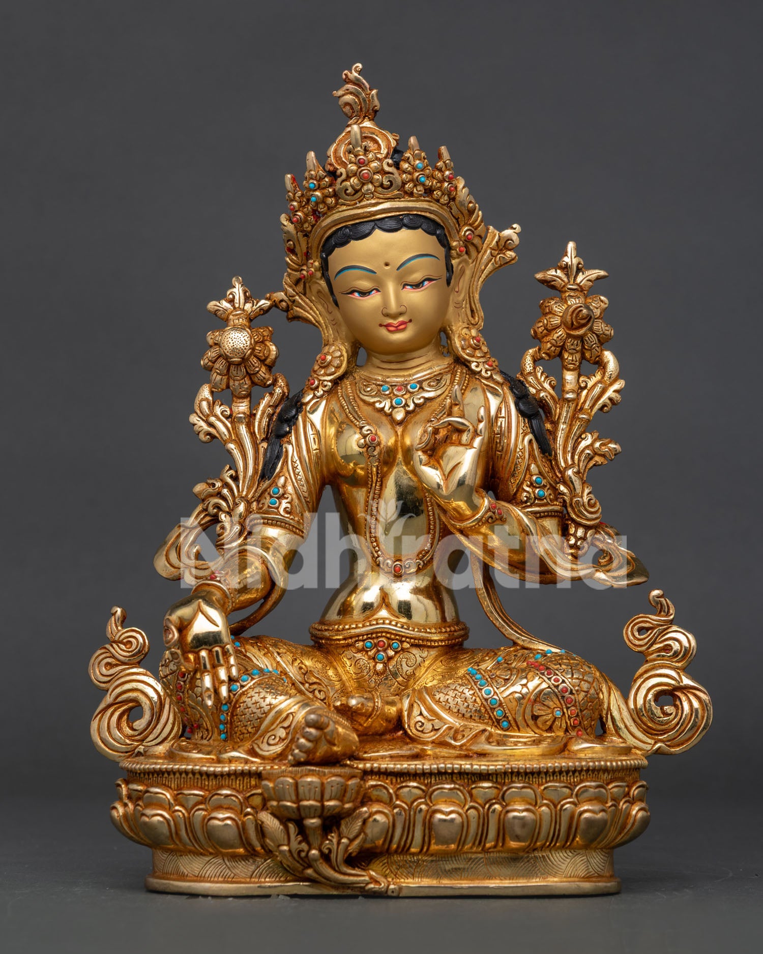 Green tara statue handcrafted by newari artisans in nepal.