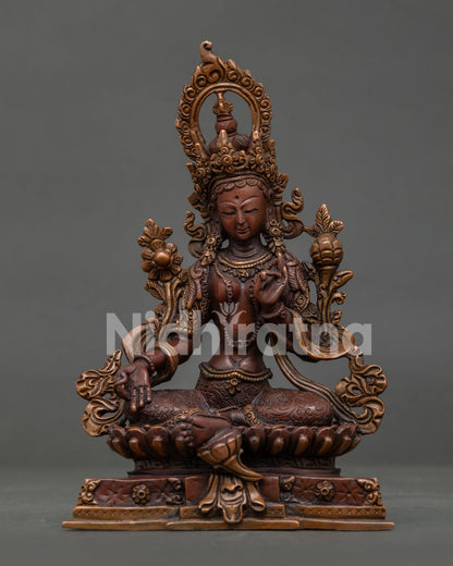 Green Tara statue handcrafted by Newari artisans in Patan Nepal oxidized copper.