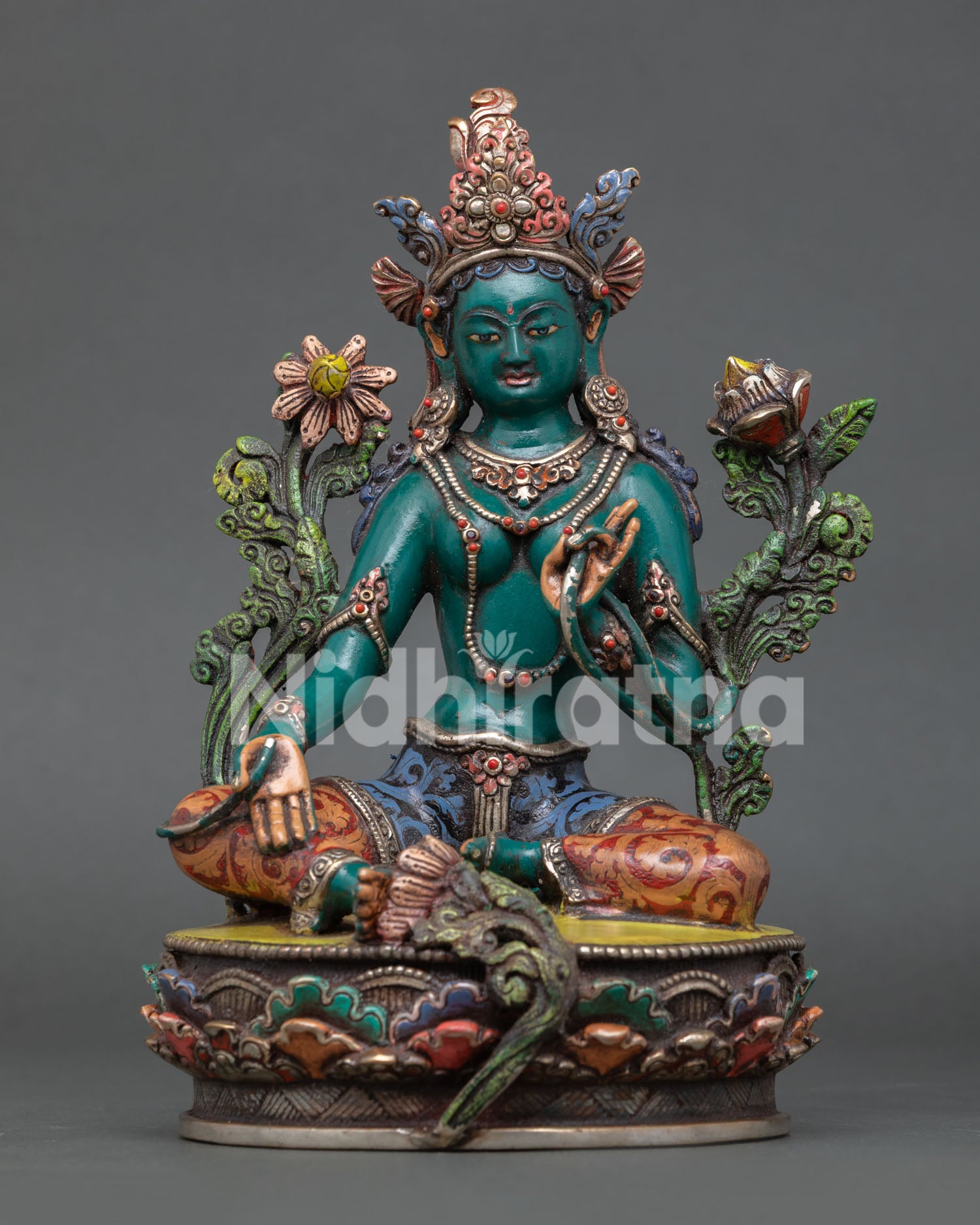 Green Tara statue, handcrafted from copper with hand-painted details and semi-precious stones.