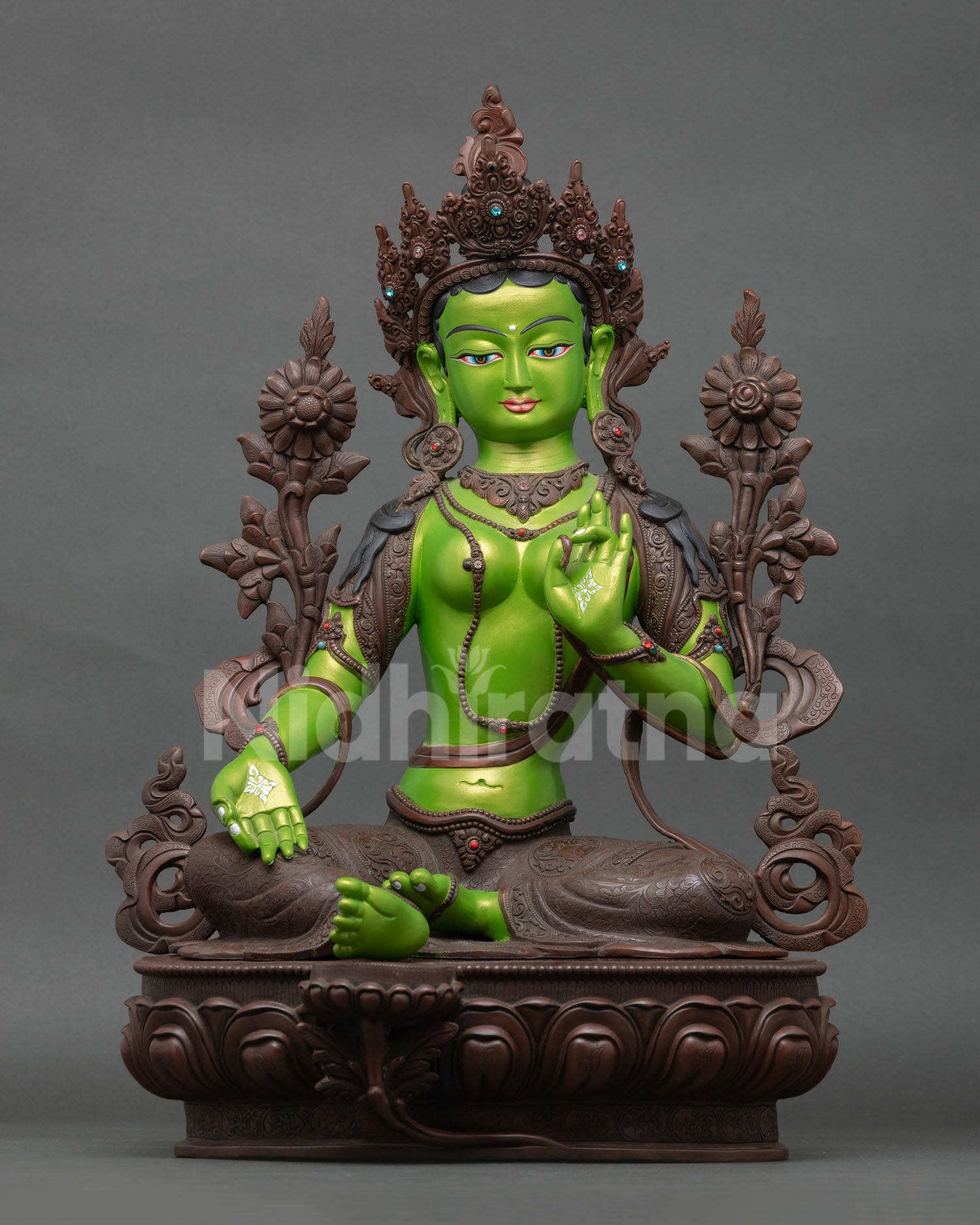 green tara statue handcrafted in nepal with oxidized copper and vibrant acrylic details