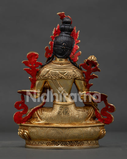 Green Tara statue handmade in Nepal with gold fire gilded copper finish.