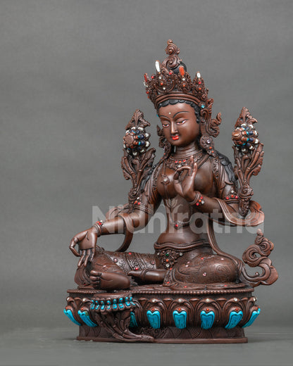 Green Tara Statue left side view hand carved floral motifs copper sculpture.