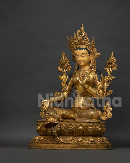 Green Tara Statue left side view, handcrafted gold gilded Buddhist sculpture