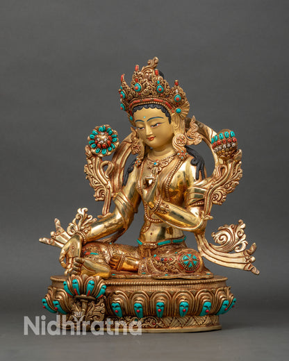Left side view of Green Tara statue showing lotus pedestal and mudra gestures