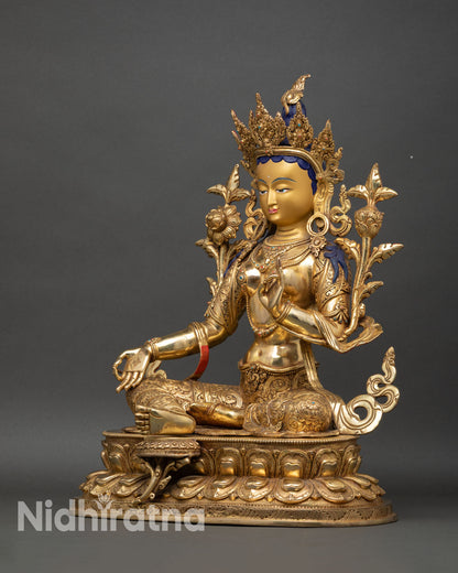 Green Tara statue left side view, showing balanced composition and traditional Nepalese artistry