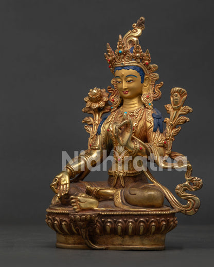 Green Tara Statue on Lotus Pedestal with Extended Right Leg.